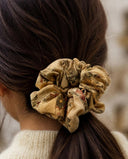 Close-up of the Beige Vintage Floral kimono scrunchie worn on a low ponytail