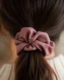 Close-up of the Mauve Rose kimono scrunchie worn on a low ponytail