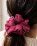 Close-up of the Raspberry Pink kimono scrunchie worn on a low ponytail