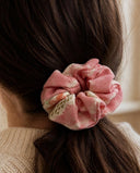 Close-up of the Rose Pink Floral kimono scrunchie worn on a low ponytail