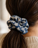 Close-up of the Blue & White Blossom kimono scrunchie worn on a low ponytail