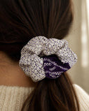 Close-up of the Purple Shibori Dots kimono scrunchie worn on a low ponytail