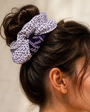 Close-up of the Purple Shibori Dots kimono scrunchie worn on a messy bun