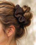 Close-up of the Coffee Brown kimono scrunchie worn on a messy bun