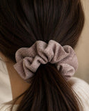 Close-up of the Mocha Taupe kimono scrunchie worn on a low ponytail