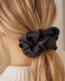 Close-up of the Espresso Brown kimono scrunchie worn on a low ponytail