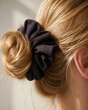 Close-up of the Espresso Brown kimono scrunchie worn on a messy bun