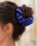 Close-up of the Royal Blue kimono scrunchie worn on a messy bun