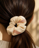 Close-up of the Cream & Peach Patchwork kimono scrunchie worn on a low ponytail