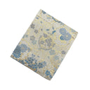 Blue Hanamaru Karakusa Ed. 03 Kimono Pocket T-Shirt with a pocket of vintage Nishijin-ori kimono silk, with blue flower roundels and golden scrolling vines