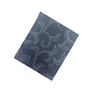 Gentle Craft Kimono Pocket T-Shirt with a pocket of vintage kimono silk, with a pale karakusa vine on deep indigo