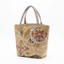 Sacred Brocade obi handbag made from a vintage Japanese obi, with floral roundels and scrolling vines