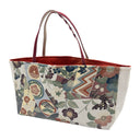Crest Collage obi bag made from a vintage Japanese obi, with scattered crests, plum blossoms, pine roundels and zigzag panels