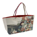 Crest Collage obi bag made from a vintage Japanese obi, with scattered crests, plum blossoms, pine roundels and zigzag panels, view 4