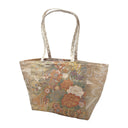 Gilded Cranes obi bag made from a vintage Japanese obi, with cranes flying over peonies, chrysanthemums and irises on gold