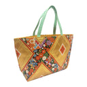 Golden Hishi obi bag made from a vintage Japanese obi, with large gold diamonds and bands of colorful flowers and small phoenixes, view 2