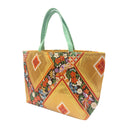 Golden Hishi obi bag made from a vintage Japanese obi, with large gold diamonds and bands of colorful flowers and small phoenixes, view 3