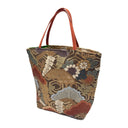 Golden Kikko obi bag made from a vintage Japanese obi, with cranes, pines and chrysanthemums over golden hexagons, view 3
