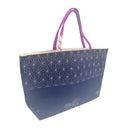 Indigo Asanoha obi bag made from a vintage Japanese obi, with a pink asanoha hemp leaf band and small flower sprays on indigo, view 4
