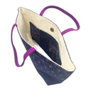 Indigo Asanoha obi bag made from a vintage Japanese obi, with a pink asanoha hemp leaf band and small flower sprays on indigo, view 5