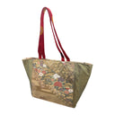 Lattice Garden obi bag made from a vintage Japanese obi, with peonies, chrysanthemums and pines beside a gold woven lattice on olive