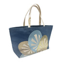 Navy Roundels obi bag made from a vintage Japanese obi, with three overlapping roundels of radiating spokes in gold, pale blue and bronze on navy, view 2