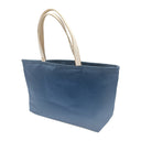 Navy Roundels obi bag made from a vintage Japanese obi, with three overlapping roundels of radiating spokes in gold, pale blue and bronze on navy, view 3
