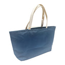Navy Roundels obi bag made from a vintage Japanese obi, with three overlapping roundels of radiating spokes in gold, pale blue and bronze on navy, view 4