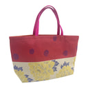 Peony Polka obi bag made from a vintage Japanese obi, with yellow peonies and blue leaves beside a red band of dark polka dots, view 4