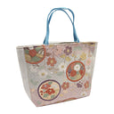 Petal Roundels obi bag made from a vintage Japanese obi, with flower roundels and scattered blossoms over a herringbone pattern on blush, view 2