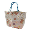 Petal Roundels obi bag made from a vintage Japanese obi, with flower roundels and scattered blossoms over a herringbone pattern on blush, view 3