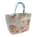Petal Roundels obi bag made from a vintage Japanese obi, with flower roundels and scattered blossoms over a herringbone pattern on blush, view 4
