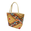 Phoenix Garden obi bag made from a vintage Japanese obi, with a phoenix and flowers flowing between golden diamonds, view 3