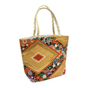 Phoenix Garden obi bag made from a vintage Japanese obi, with a phoenix and flowers flowing between golden diamonds, view 4