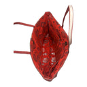 Ruby Trail obi bag made from a vintage Japanese obi, with a band of dark diamonds and a wavy beige line on textured red, view 6