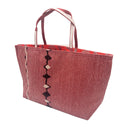 Ruby Trail obi bag made from a vintage Japanese obi, with a band of dark diamonds and a wavy beige line on textured red
