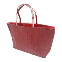 Ruby Trail obi bag made from a vintage Japanese obi, with a band of dark diamonds and a wavy beige line on textured red, view 3