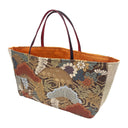 Russet Pines obi bag made from a vintage Japanese obi, with stylized pines, a folding fan and small cranes over golden hexagons