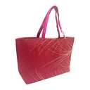 Scarlet Cascade obi bag made from a vintage Japanese obi, with sweeping white and gold lines falling in arcs across red, view 4