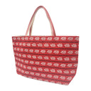 Scarlet Sprigs obi bag made from a vintage Japanese obi, with rows of small white leaf sprigs and black dotted lines on red