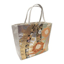 Silver Ribbons obi bag made from a vintage Japanese obi, with coral peonies, bamboo leaves and sweeping gold ribbon bands on silver, view 2